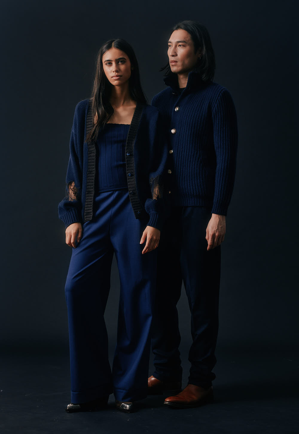 Model wearing the Antonia Zander Raya Pant Suit in Navy styled with Safra Cardigan.